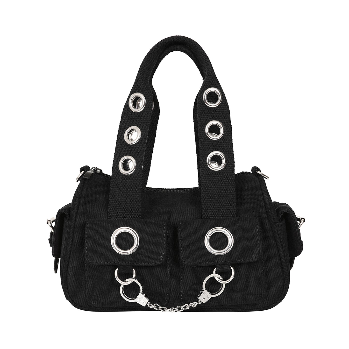 Bolso de mano o bandolera con ojales metálicos en los bolsillos y en las asas. Fabricado en tela de algodón y con esposas de decoración en la parte frontal. Vista frontal