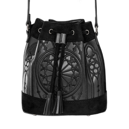 Bolso bandolera en forma de saco con cierre de cordón con borlas en la parte superior. Bordado inspirado en los rosetones de las catedrales. Tejido sintético estilo ante y piel. Modelo Sanctum Bucket de Restyle en color negro vista frontal
