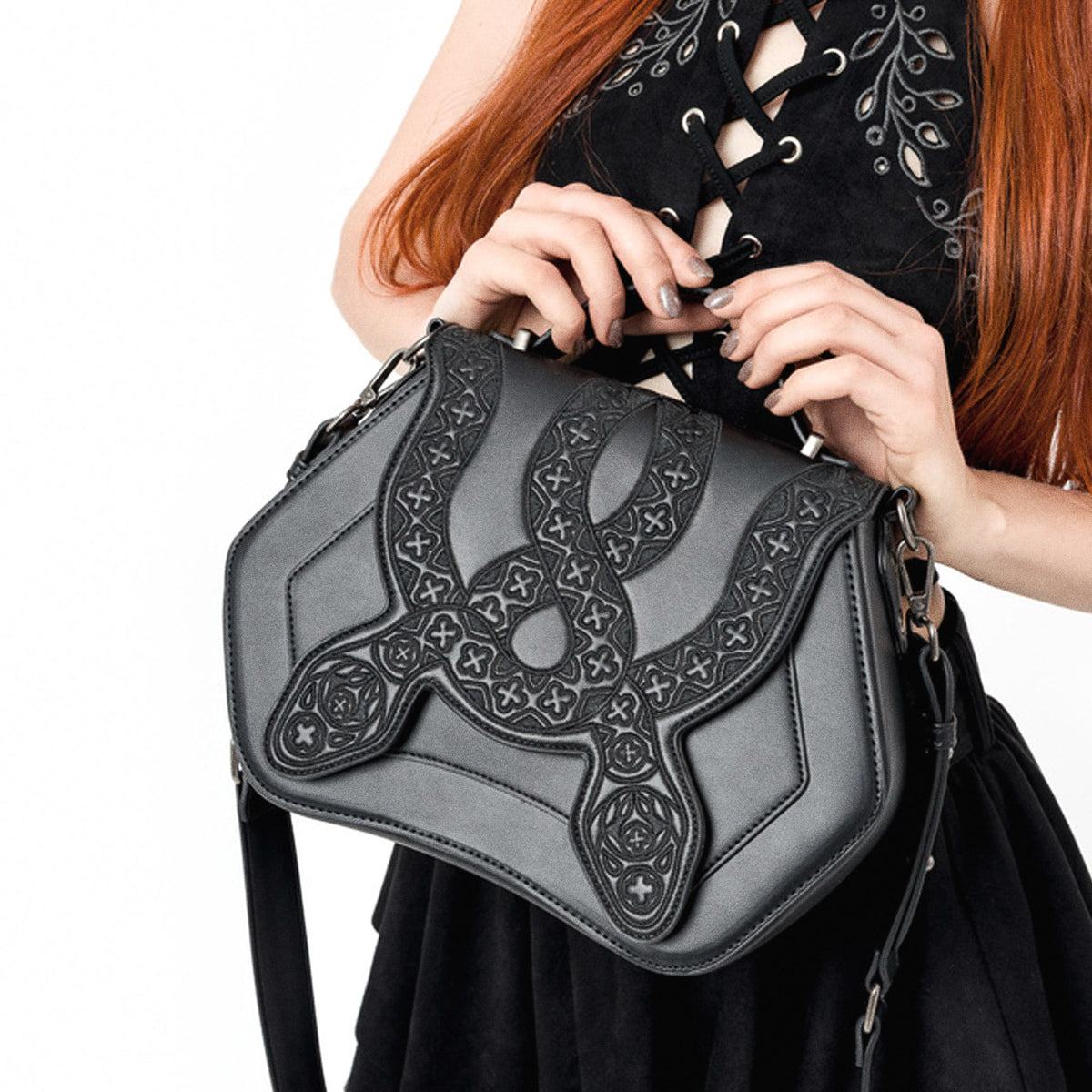  Rigid black crossbody bag with embroidered snakes - worn by model