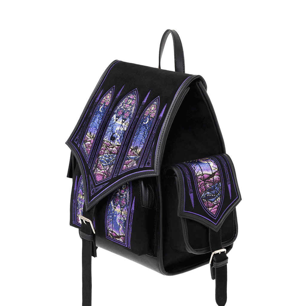 Mochila bordada con motivos de ventanales góticos y auroras boreales de la colección Northern Lights de Restyle en colores fríos y cálidos vista lateral