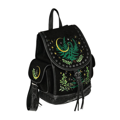 Mochila con bordado inspirado en un bosque mágico Herbal de Restyle en tonos verdes y amarillos con fondo negro vista ángulo