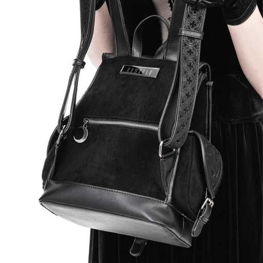 Mochila gótica con detalles cortados a láser en solapa y bolsillos laterales inspirados en las catedrales góticas modelo Rosarium de Restyle vista posterior de detalle cremallera con luna metálica y logo