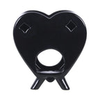 Quemador de aceites esenciales y calentador de cera estilo gótico de ouija en blanco y negro gótico vista posterior negra sobre fondo blanco.