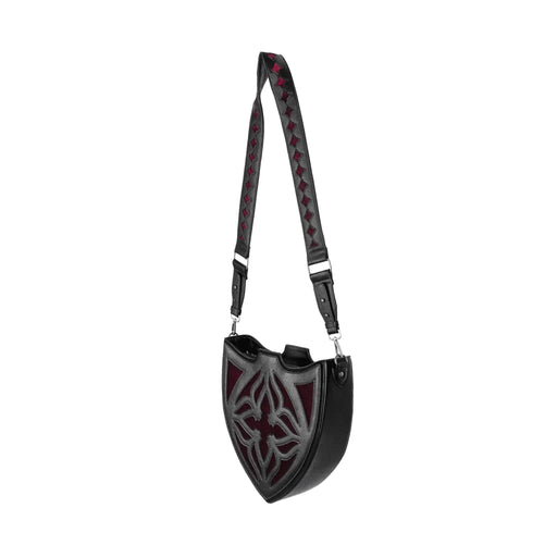 Bolso bandolera negro con diseño rígido en forma de escudo inspirado en las catedrales y la arquitectura medieval con detalles en terciopelo burdeos modelo Claretia de Restyle vista ángulo completo con correa