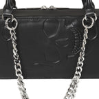  Close-up of the skull embossed onto the surface of the black gothic bag