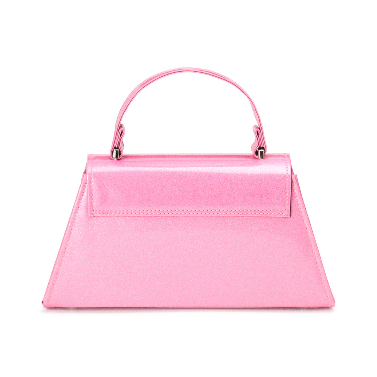 Vista trasera del bolso The Rumbler en rosa brillante, mostrando su diseño limpio y la unión del asa superior.