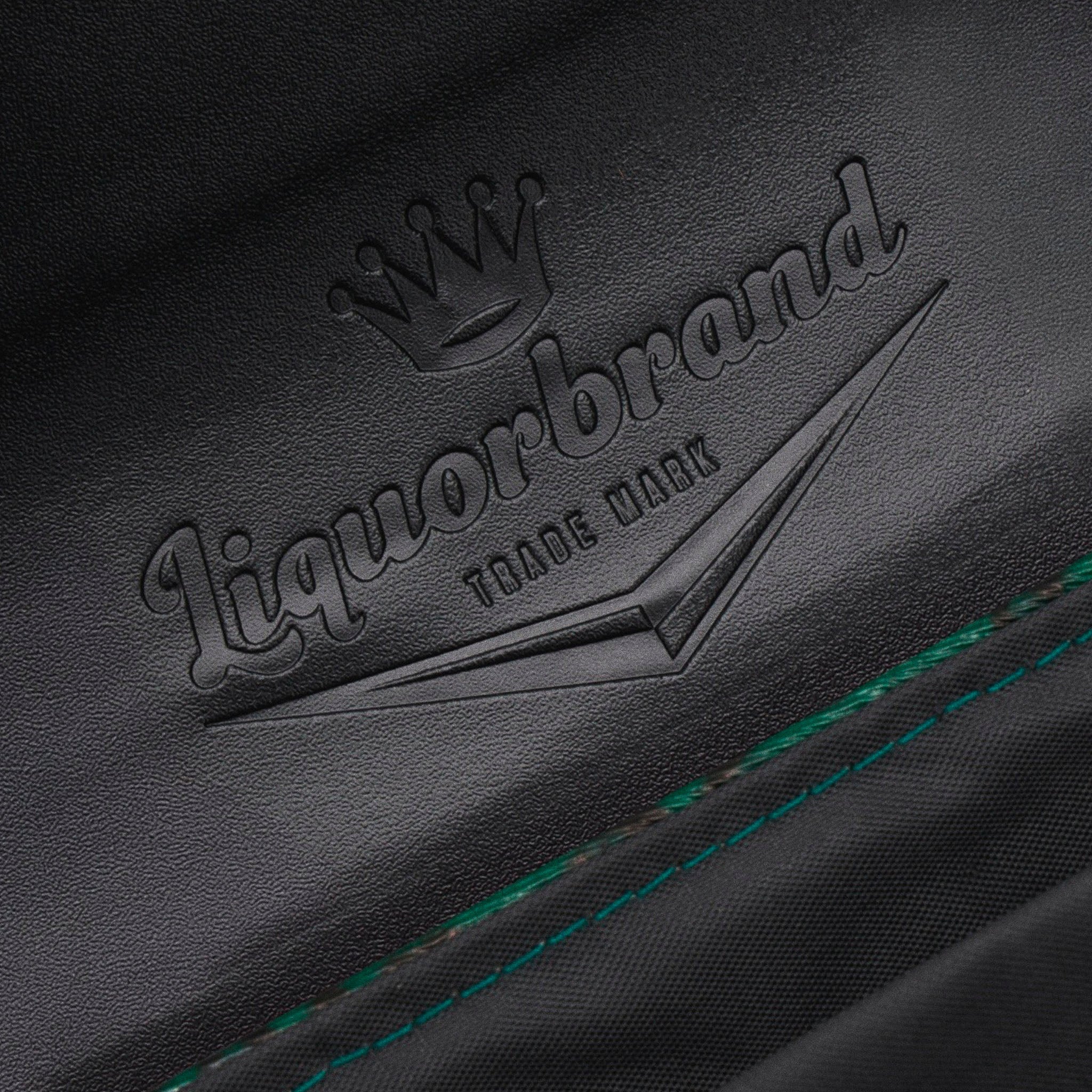  Detail of Liquorbrand logo engraved inside the black flap of the Stardust Rumbler bag