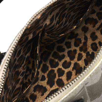 Interior de bolso Liquorbrand Lil' Rocket forrado con estampado de leopardo y compartimentos abiertos.

