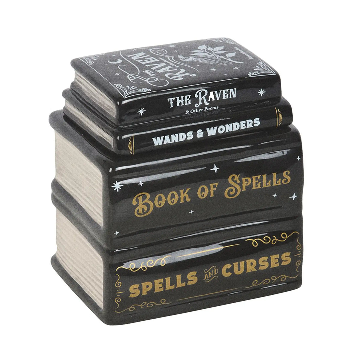 Quemador de aceite y de cera en forma de libros apilados estilo witchy gótico vista ángulo sobre fondo blanco.