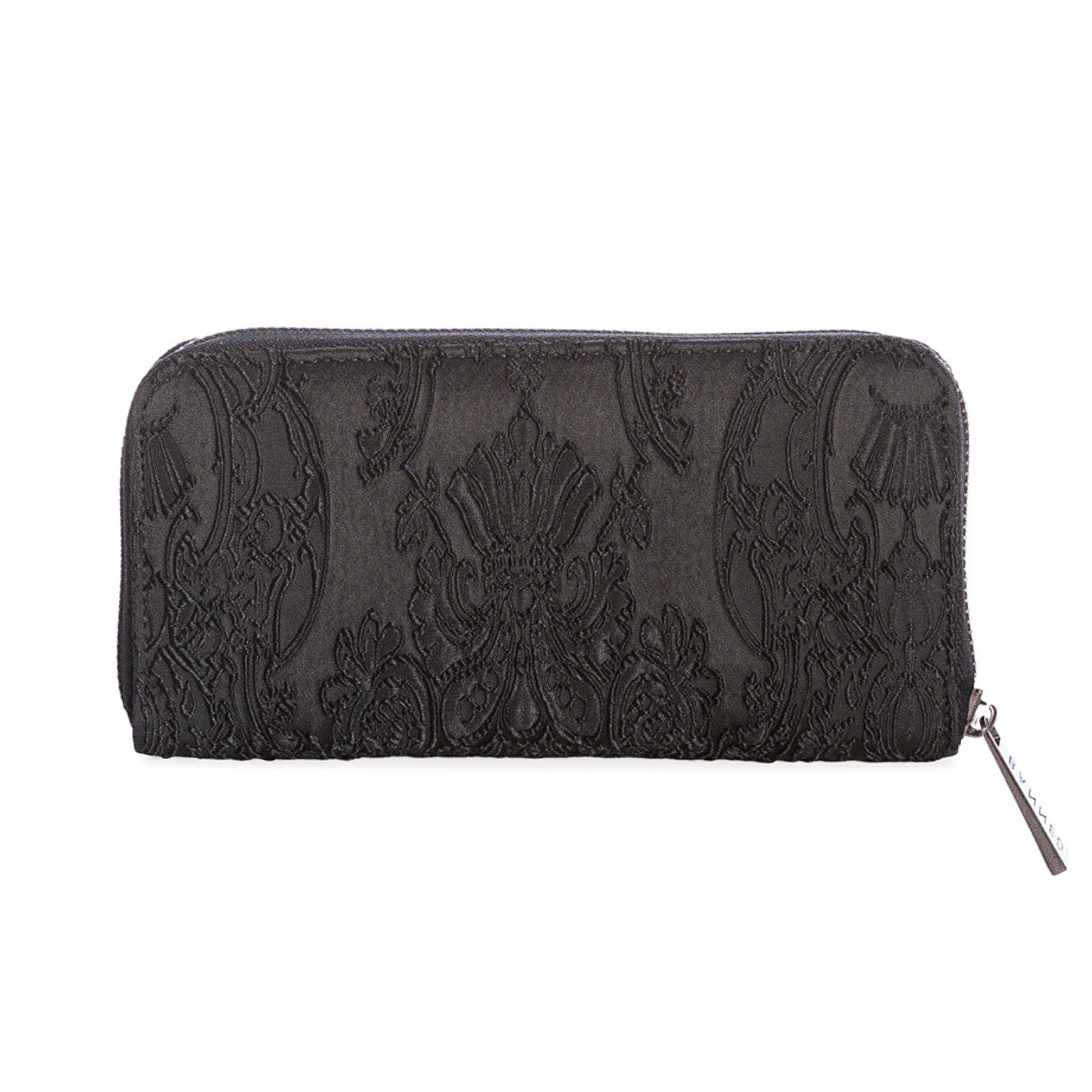 Vista trasera de la cartera gótica, mostrando el tejido con patrón barroco negro.