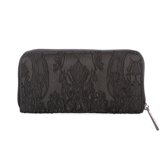Vista trasera de la cartera gótica, mostrando el tejido con patrón barroco negro.