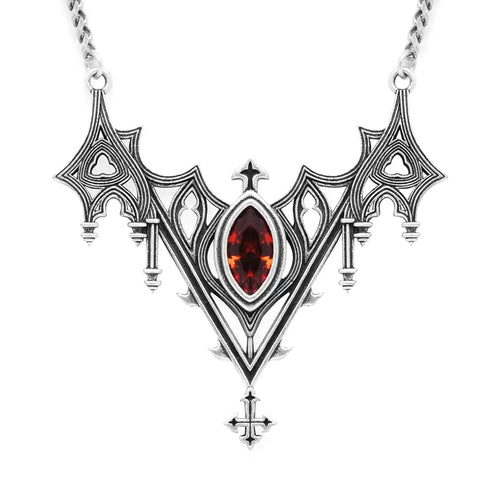 Collar con silueta de murciélago creada por detalles inspirados en catedrales góticas y piedra roja central engarzada fabricado en latón y plata de ley de Restyle vista detalle del colgante