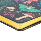 Detalle de cantos de hojas libreta en dorado.