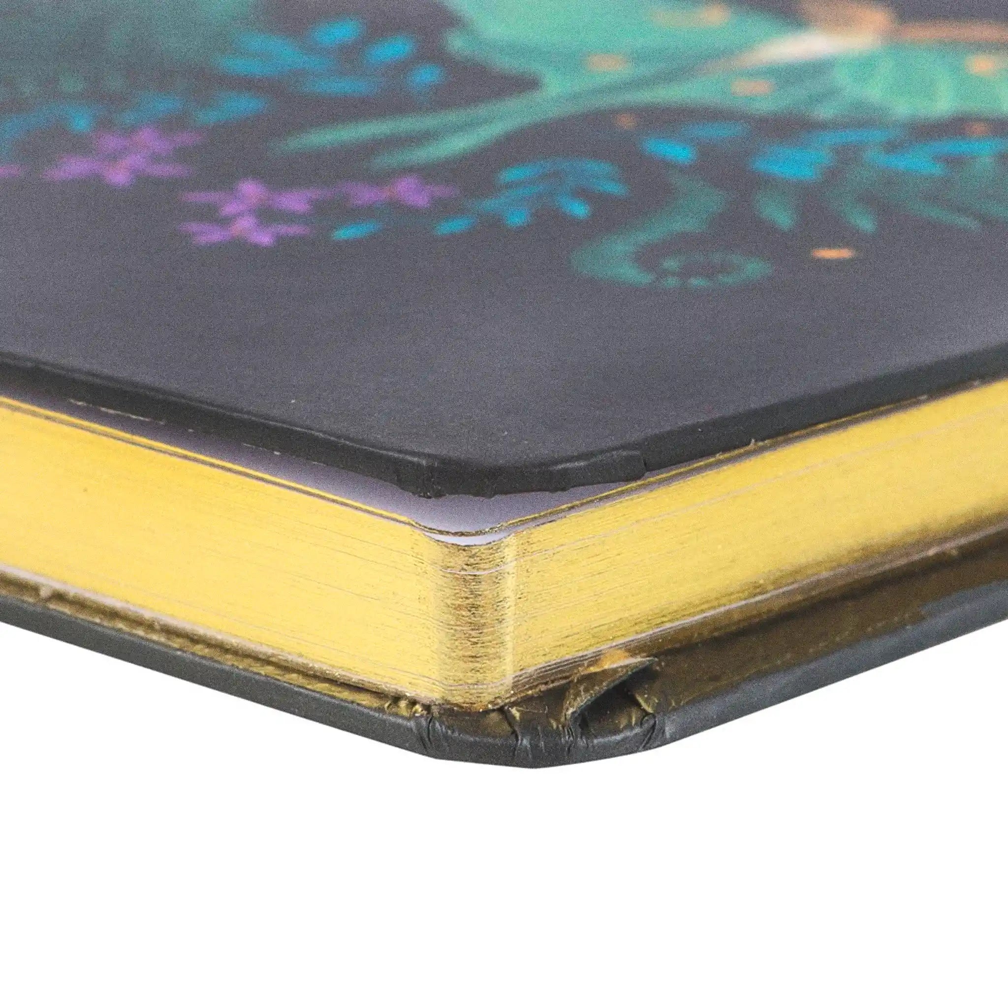 Detalle de cantos dorados de libreta.
