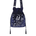 Restyle Lunar Eclipse bucket bag front view showing strap and decorative tassels midnight blue velvet