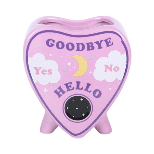 Jarrón estilo pastel goth con diseño de planchette de ouija en rosa estilo kawaii vista frontal sobre fondo blanco.