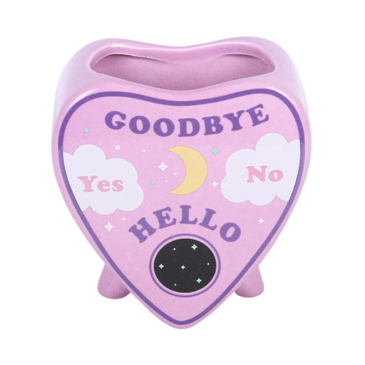 Jarrón estilo pastel goth con diseño de planchette de ouija en rosa estilo kawaii vista frontal sobre fondo blanco.