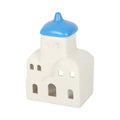 Quemador de aceites esenciales y calentador de cera con forma de casa de Santorini inspirado en Grecia en blanco y azul vista frontal sobre fondo blanco.