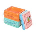 Quemador de aceites esenciales y calentador de cera en forma de libros apilados de diferentes destinos de viaje multicolor vista sin tapa sobre fondo blanco.