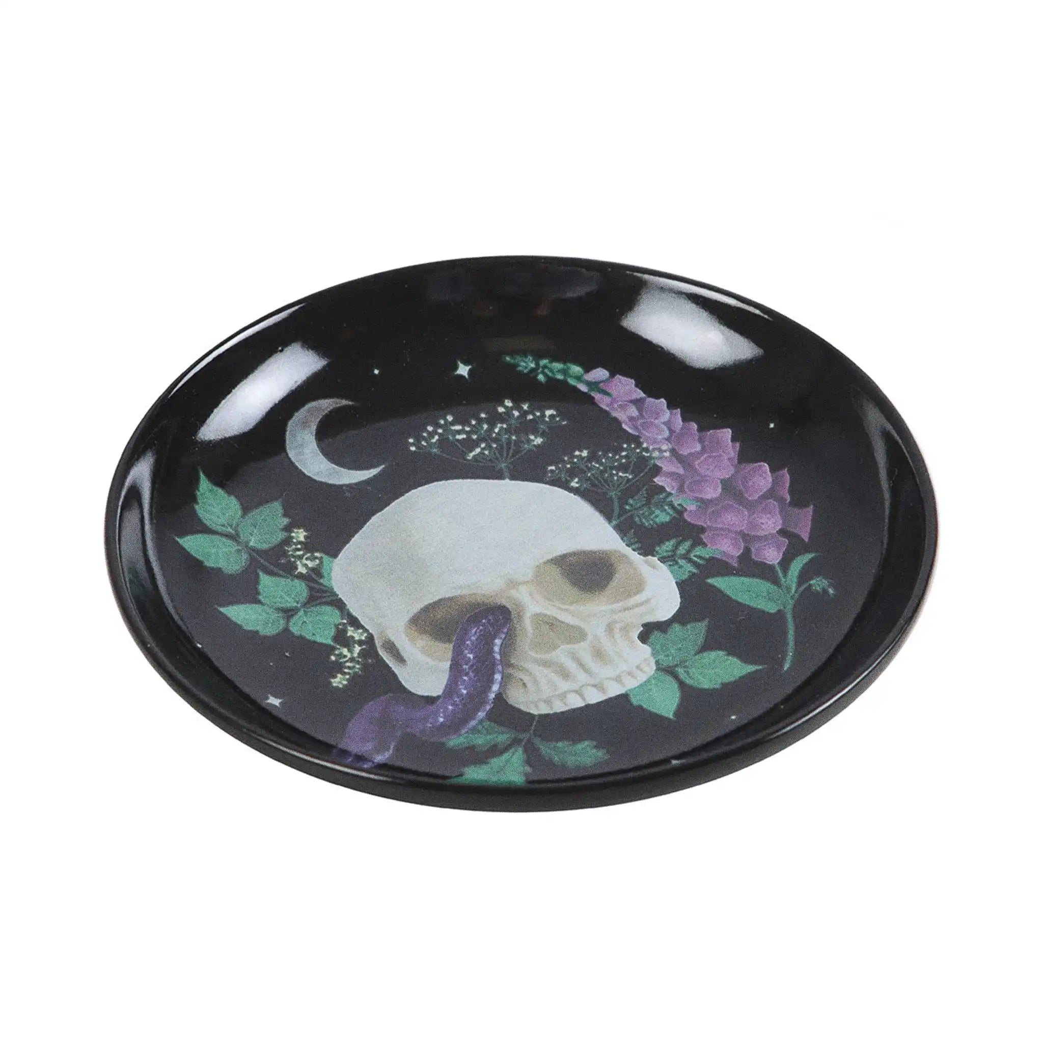 Plato para joyería con diseño de calavera, serpiente y plantas estilo gótico visto desde un lateral sobre fondo blanco.