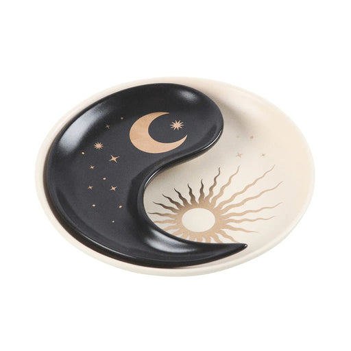 Plato para joyería yin yang con diseño apilable en dos piezas estilo whimsical visto desde un lateral con fondo blanco.